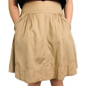 A line khaki midi side pockets zipper back